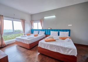 Postel nebo postele na pokoji v ubytování Cucuu Nest Villa Coonoor by VOYE HOMES