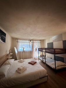 Postel nebo postele na pokoji v ubytování Aurice Maison