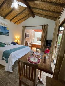 Postel nebo postele na pokoji v ubytování Chalés Paraty Real + 37 fotografií