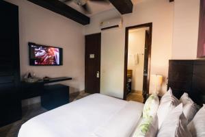 TV a/nebo společenská místnost v ubytování Hotel Boutique Santo Toribio