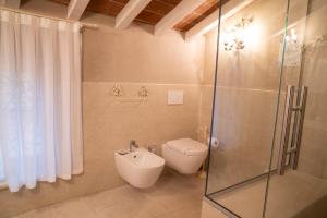 Kúpeľňa v ubytovaní Regia Rosetta - Royal Rooms Borghetto