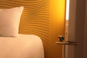 Letto o letti in una camera di B&B HOTEL Beaune Sud 2