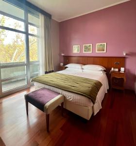 Postel nebo postele na pokoji v ubytování Hotel Fenix + 37 fotografií