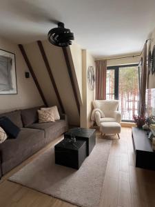Apartman Aspen Divcibareにあるシーティングエリア