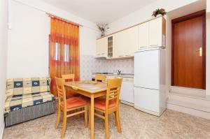 Kuchyň nebo kuchyňský kout v ubytování Apartments Brane