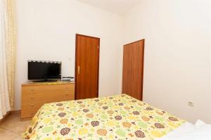 Postel nebo postele na pokoji v ubytování Apartments Brane