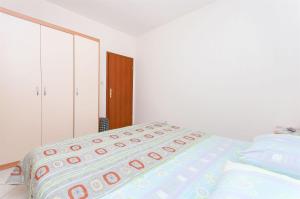 Postel nebo postele na pokoji v ubytování Apartments Brane