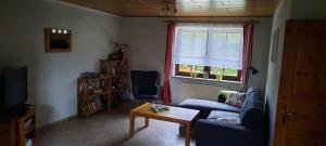 Posezení v ubytování Das kleine, gemütliche Ferienhaus