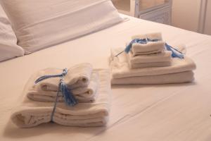 Posteľ alebo postele v izbe v ubytovaní Regia Rosetta - Royal Rooms Borghetto