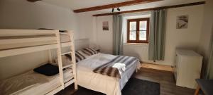 Postel nebo postele na pokoji v ubytování Haus am Seebach Leutasch Weidach