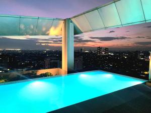 Bazén v ubytování Kwarto Nina nebo v jeho okolí