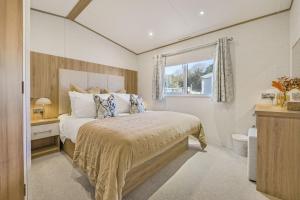 Voodi või voodid majutusasutuse Seaview Holiday Let - Vale Holiday Park at Cardiff Airport toas