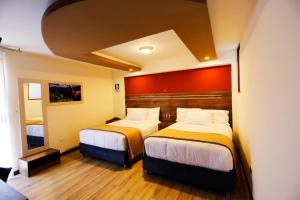Voodi või voodid majutusasutuse INKALAM cusco toas