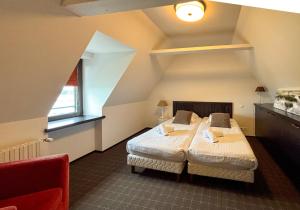 Postel nebo postele na pokoji v ubytování Ker nelly