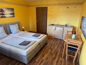 Kuchyň nebo kuchyňský kout v ubytování Beny Hotel Restaurant