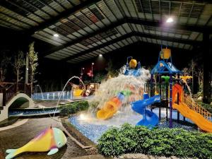 a water park with a water slide and slides at Lotus Wyndham Thanh Thủy in Phú Thọ