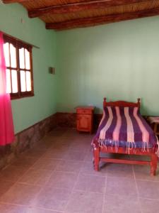 Postel nebo postele na pokoji v ubytování Entre Pajonales