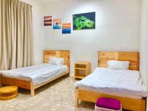 Postel nebo postele na pokoji v ubytování 411Motel