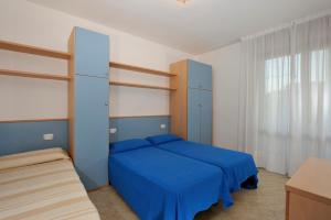 Posteľ alebo postele v izbe v ubytovaní Argonauti