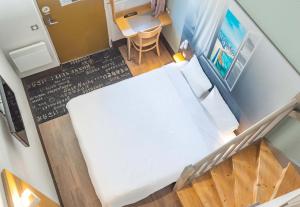 Ein Bett oder Betten in einem Zimmer der Unterkunft B&B HOTEL Saint-Malo Centre