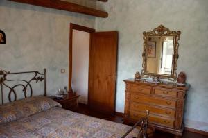 En eller flere senge i et værelse på Villa Ninfea + 12 billeder