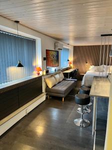 TV a/nebo společenská místnost v ubytování The Apartment