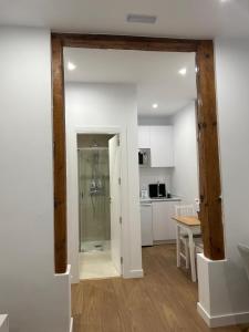 Η κουζίνα ή μικρή κουζίνα στο Apartamentos Gravina