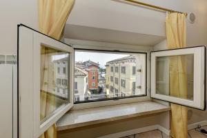 Fotografia z galérie ubytovania Flowers Apartments v destinácii Desenzano del Garda