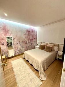 Ένα ή περισσότερα κρεβάτια σε δωμάτιο στο Apartamentos Albamar-Nuevos-Redomeira-Premium