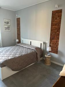 Postel nebo postele na pokoji v ubytování B&Bi13 + 15 fotografií
