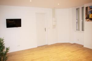 Telewizja i/lub zestaw kina domowego w obiekcie Cattleya location