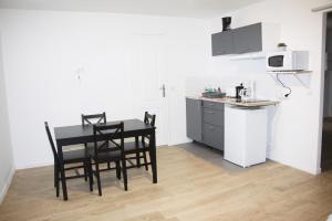 Kuchnia lub aneks kuchenny w obiekcie Cattleya location