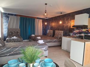 Ein Sitzbereich in der Unterkunft Waregem Hotel A