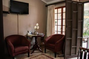 TV a/nebo společenská místnost v ubytování Drakensview Self Catering
