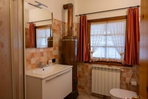 Koupelna v ubytování Baita de Eliseo B&B