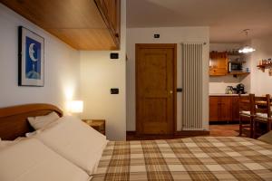 Postel nebo postele na pokoji v ubytování Baita de Eliseo B&B
