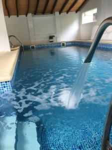 The swimming pool at or close to Mirador de Miranda Apartamentos Rural & Spa Inc