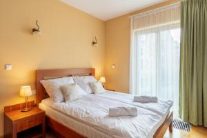 Posteľ alebo postele v izbe v ubytovaní Sobieski Prestige Apartment - 6 min Main Square Kraków
