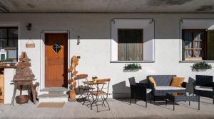 Posezení v ubytování Baita de Eliseo B&B
