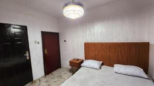 Voodi või voodid majutusasutuse CG Apartments toas