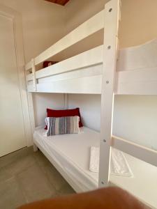a bunk bed in a room with a ladder at BED&BIKEITALIA - Anguillara Sabazia - AL BORGO in Anguillara Sabazia +26 photos