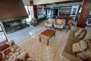 Posezení v ubytování Residencial Pousada do Serrano - Ao lado da Rua Torta!