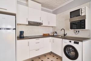Kuchyňa alebo kuchynka v ubytovaní Fantástico apartamento junto a la estación