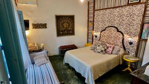 a bedroom with a bed in a room at Hospedaria Santa Bárbara in Rio de Janeiro +44 photos