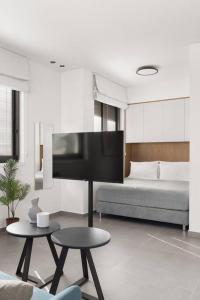 Ένα ή περισσότερα κρεβάτια σε δωμάτιο στο Luxury Studio Beach Flat 526