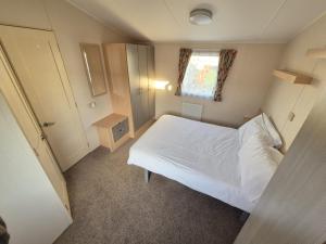 Postel nebo postele na pokoji v ubytování Whitstable Caledonia + 37 fotografií
