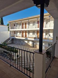 a view of a building from the balcony at El Rinconcito Mágico in El Bosque