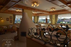 Veitingastaður eða matsölustaður á Chalet La Felce