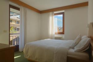 Rúm í herbergi á Chalet La Felce