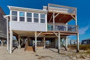 a large wooden house on the beach at OIB28 Summer Sands in Ocean Isle Beach